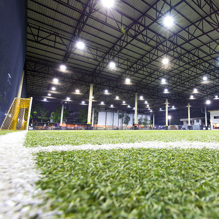 a soccer field utilizing used artificial turf for indoor sports