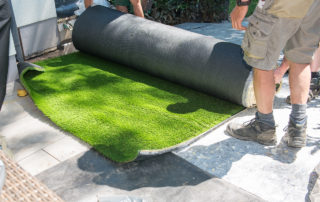 professional gardeners are rolling out artificial turf